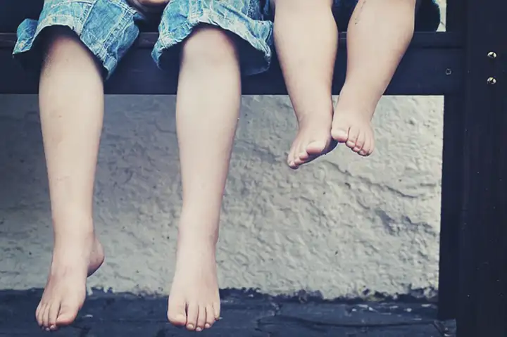 Por que as meninas são mais altas que os meninos?